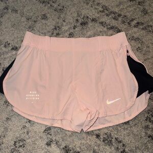 Nike Women's Soft Pink Athletic Shorts